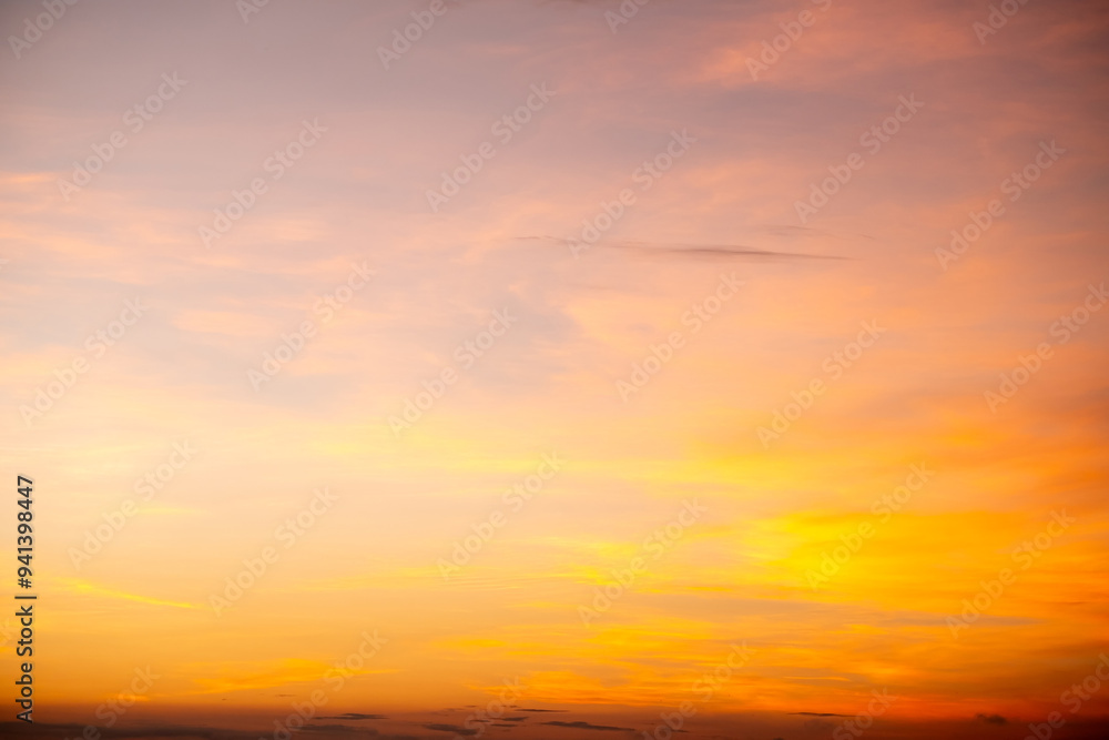 Beautiful , luxury soft gradient orange gold clouds and sunlight on the blue sky perfect for the background, take in everning,Twilight, Large size, high definition landscape photo Beautiful , luxury soft gradient orange gold clouds and sunlight on the blue sky perfect for the background, take in everning,Twilight, Large size, high definition landscape photo