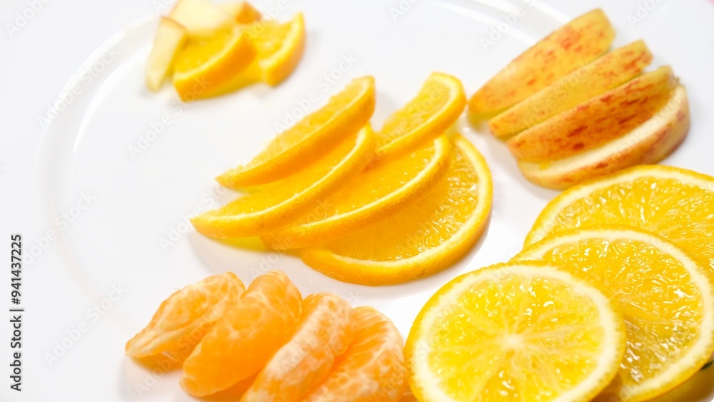 organic fresh orange, apple, malta decorated on white ceramic plate with close shot organic fresh orange, apple, malta decorated on white ceramic plate with close shot