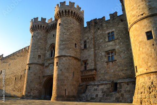 Rhodes castle in old town by sunset