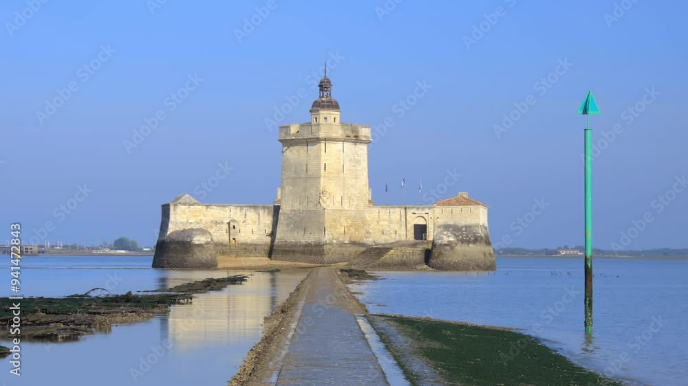Front view of Fort Louvois fortress at low tide on a sunny day Front view of Fort Louvois fortress at low tide on a sunny day