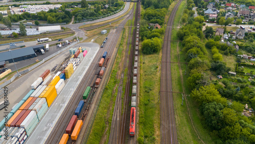 Drone photography of a railway in an old industrial part of a city during summer day