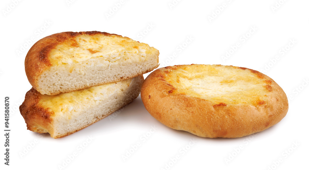 Khachapuri. Cut in half and whole bun with cheese isolated on white background.Cheese pie. Khachapuri. Cut in half and whole bun with cheese isolated on white background.Cheese pie.