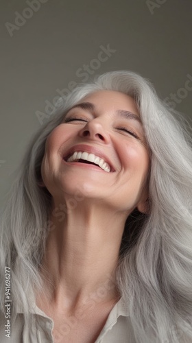 Elegant Portrait of a Beautiful Senior Woman with Grey Hair Smiling: Perfect for Skincare, Dental Care, and Health Beauty Campaigns. Minimalist Design with Copy Space for Marketing and Promotional Use