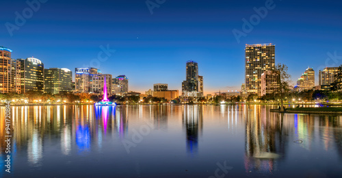 Orlando skyline at night. Panoramic view of Orlando city in Lake Eola, Florida, USA photo