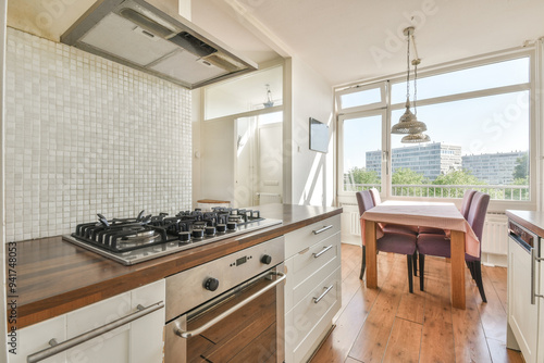 Modern kitchen interior with natural lighting photo