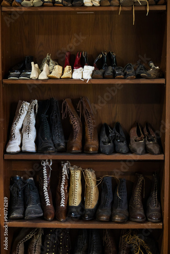 Wallpaper Mural Old fashioned shoes and boots lines up on a shelf Torontodigital.ca