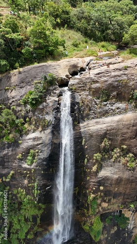 Waterfall in the jungle with natural pools on top. Drone view. Diyaluma Waterfall, Sri Lanka.