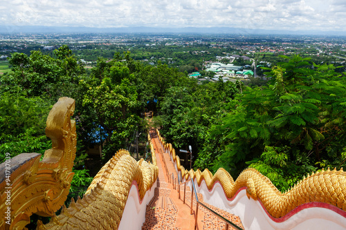 Chiang Mai view from Wat Phra That Doi Kham. Stair s to the buddhist temple in North Thailand. photo