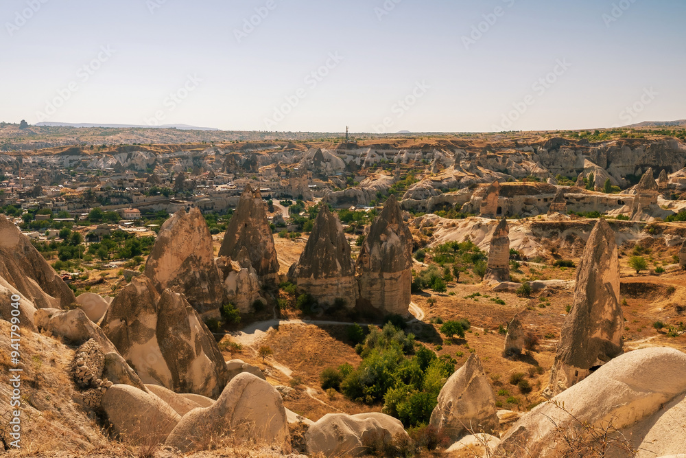 Stunning Rock Formations in Cappadocia Under Clear Blue Sky