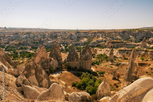Obraz na płótnie Stunning Rock Formations in Cappadocia Under Clear Blue Sky w salonie