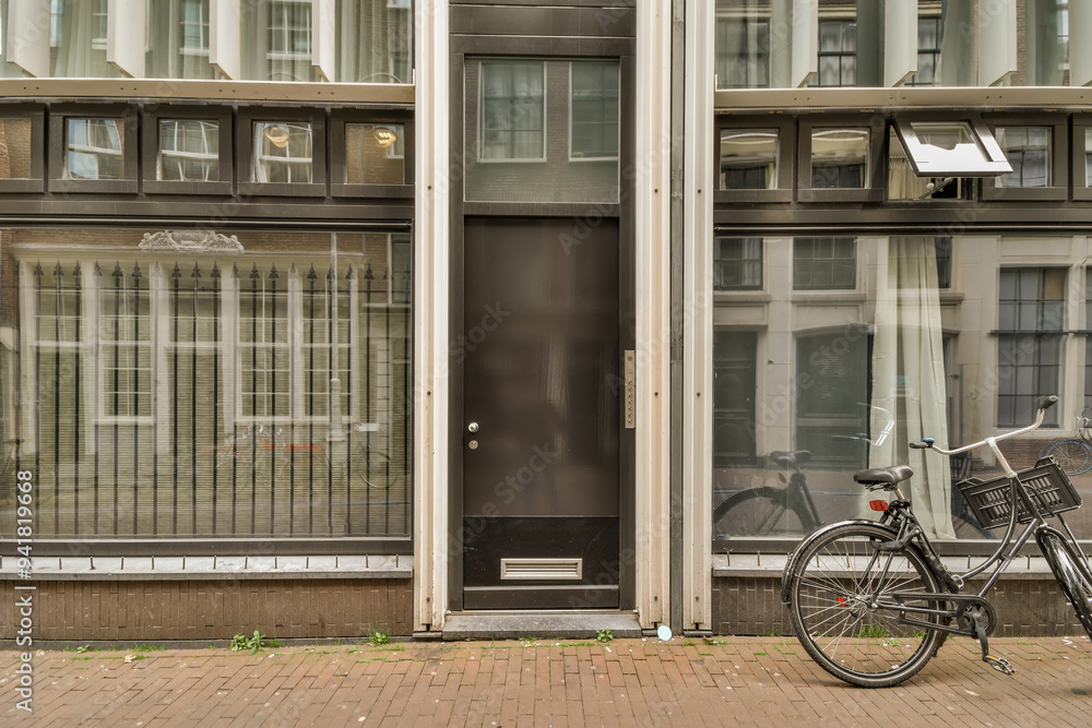 European city street with a bicycle and a building facade European city street with a bicycle and a building facade