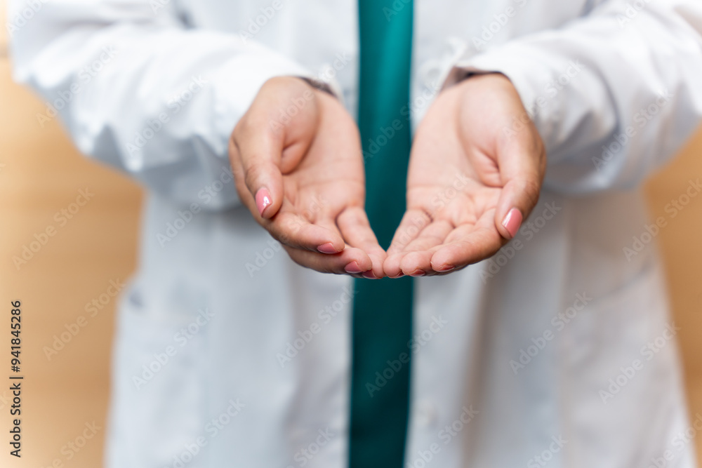 Close up of the open hands of a healthcare worker Close up of the open hands of a healthcare worker