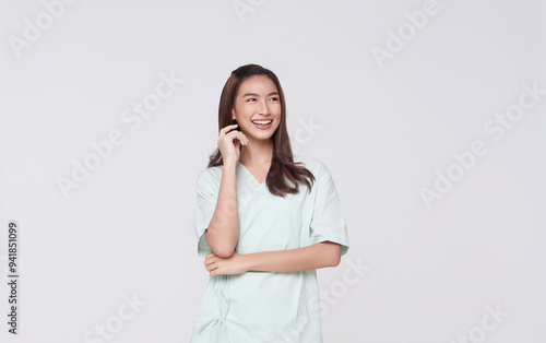 Happy asian woman patient arms crossed isolated on white studio background. life insurance and coverage concept.