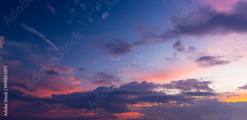 Colorful clouds and sky,Dusk, Sunset Sky Clouds in the Evening with colorful Orange, Yellow, Pink and red sunlight and Dramatic storm clouds on Twilight sky