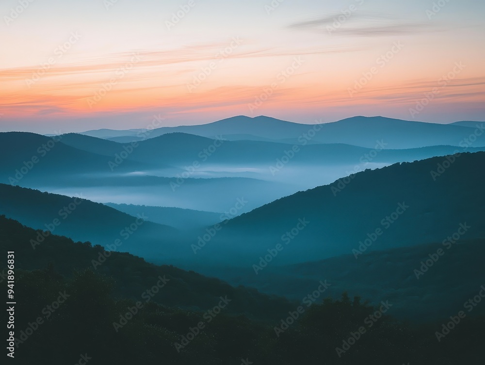 Misty mountains at dawn with gradient sky, Blue Ridge Parkway Misty mountains at dawn with gradient sky, Blue Ridge Parkway