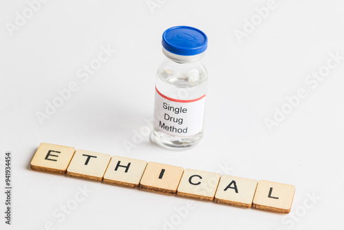 Medical Vial with label on a white background photo