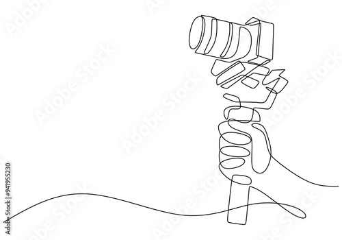 One Line Drawing of Hand Holding Camera - Photography Day Celebration Concept.