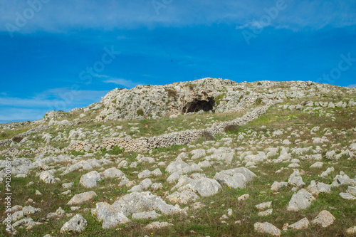 Una grotta scavata nelle rocce di una scogliera lungo il Cammino del Salento che da Lecce porta a Santa Maria di Leuca photo