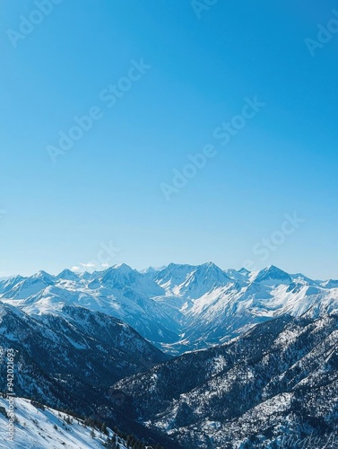 Wallpaper Mural Breathtaking mountain landscape under a clear blue sky, showcasing snow-covered peaks and serene valleys for outdoor adventure. Torontodigital.ca