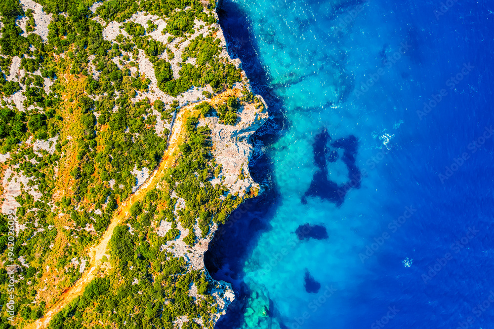 Fototapeta premium Blue caves on Zakynthos island or Zante Island, Greece. Beautiful views of azure sea water and nature with cliffs cave