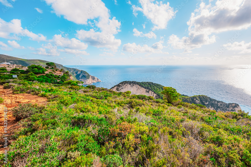 Zakynthos, Greece. Navagio Beach with wrecked ship in Ionian Sea. Beautiful views of azure sea water and nature with cliffs cave. Zakynthos, Greece. Navagio Beach with wrecked ship in Ionian Sea. Beautiful views of azure sea water and nature with cliffs cave.