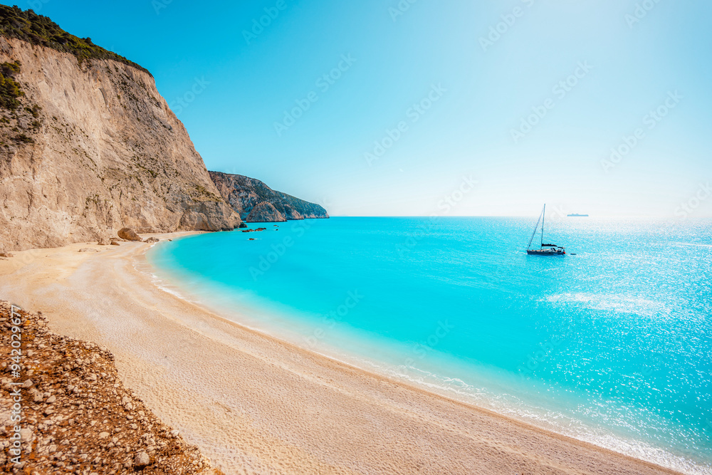Beach of Port Katsiki with turquoise shining ocean on the island of Lefkada, Ionian Sea, Greece Beach of Port Katsiki with turquoise shining ocean on the island of Lefkada, Ionian Sea, Greece