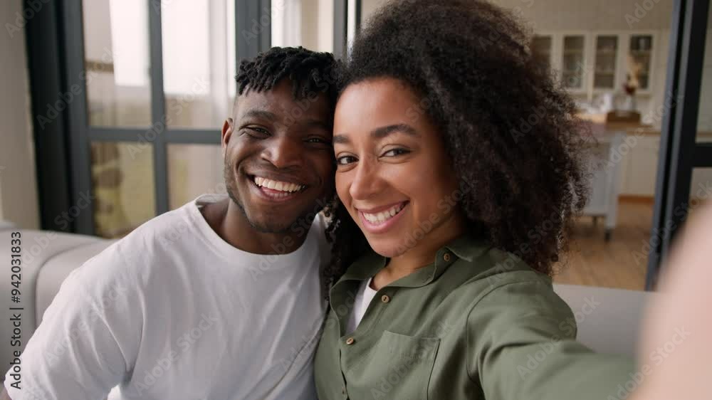 Happy affectionate couple ethnic African American family photo mobile phone at home smiling grimacing selfie camera female girlfriend male boyfriend girl guy man woman bloggers influencers video blog Happy affectionate couple ethnic African American family photo mobile phone at home smiling grimacing selfie camera female girlfriend male boyfriend girl guy man woman bloggers influencers video blog