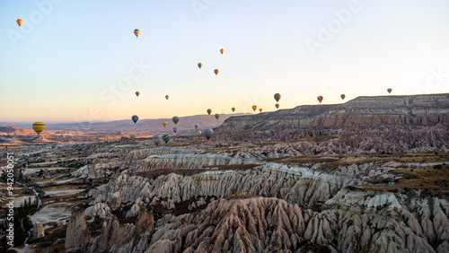 Beautiful landscape of Cappadocia in Turkey with hot air balloons. 