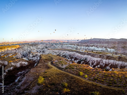 Beautiful landscape of Cappadocia in Turkey with hot air balloons. 
