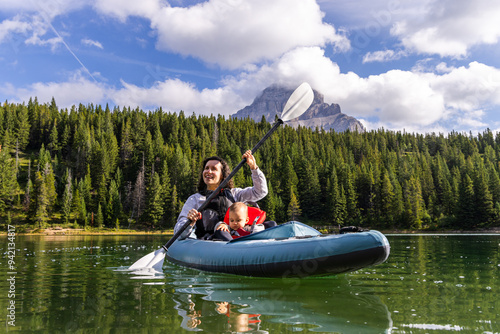 Mother and Child Kayaking on Chinook Lake in Alberta, Canada photo