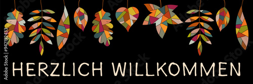Herzlich Willkommen - Schriftzug in deutscher Sprache. Banner mit bunten Blättern auf schwarzem Hintergrund.