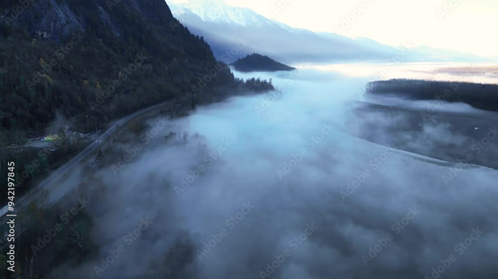 Aerial view of the Island 22 Regional Park along Fraser River in Chilliwack, British Columbia, Foggy weather. Canada. Top aerial view Aerial view of the Island 22 Regional Park along Fraser River in Chilliwack, British Columbia, Foggy weather. Canada. Top aerial view