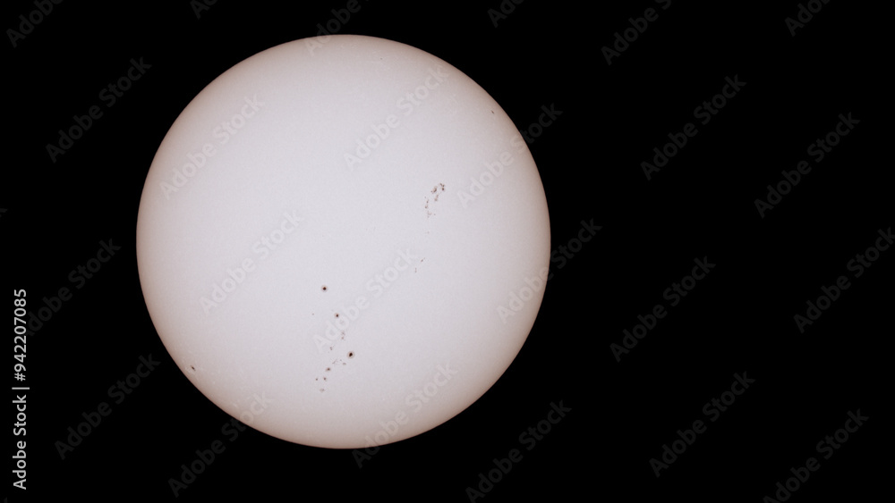 photograph of the sun made with a reflex camera, sunspots are observed