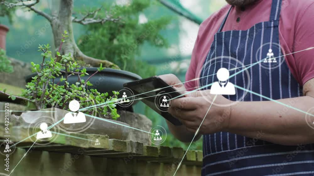 Using tablet in garden, person with apron, social network connections animation Using tablet in garden, person with apron, social network connections animation