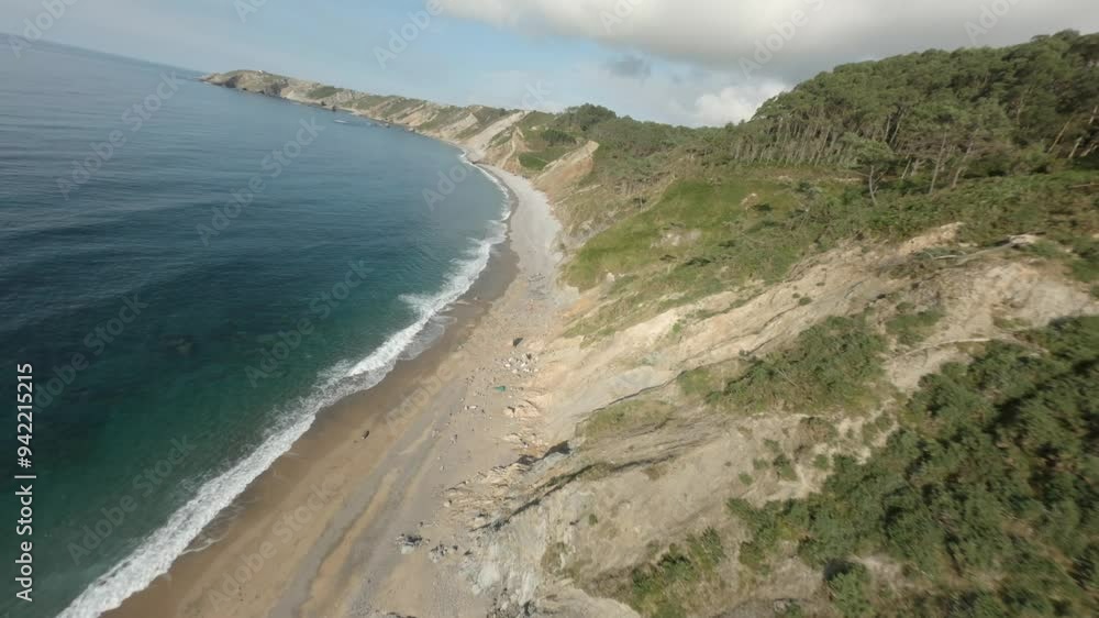 Dramatic aerial movement towards from the beautiful Vallina coastline at Asturias, Spain. Dramatic aerial movement towards from the beautiful Vallina coastline at Asturias, Spain.