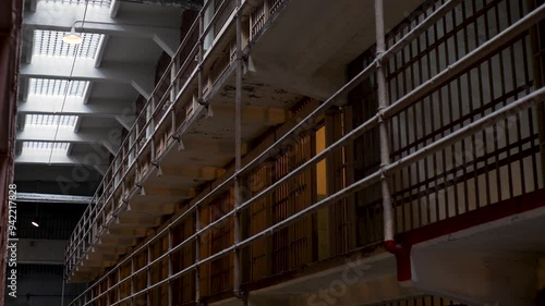 Slow motion landscape inside prison cell block jail gaol crime penitentiary bars railings Alcatraz Island San Francisco city California USA America travel tourism attraction landmark