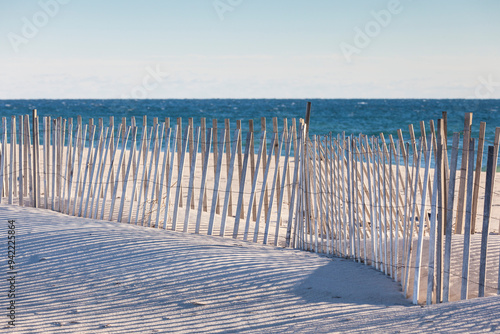 USA, Massachusetts, Nantucket Island. Madaket. Madaket Beach, sand fence and shadows. photo