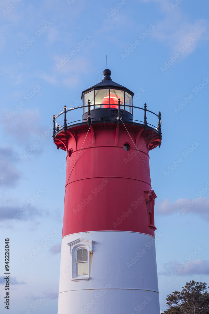 USA, Massachusetts, Cape Cod, Eastham. Nauset Light with Christmas wreath at dawn. USA, Massachusetts, Cape Cod, Eastham. Nauset Light with Christmas wreath at dawn.