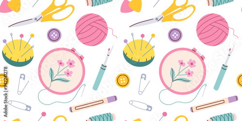 Seamless pattern with sewing accessories on a white background