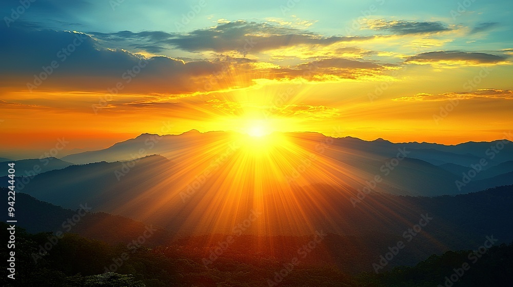 Sunset over mountain range with foreground mountains & distant trees Sunset over mountain range with foreground mountains & distant trees