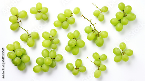 Fresh Green Grapes and Half-Sliced Grapes Displayed on a Clean Surface