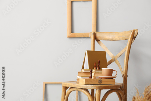 Books with chess pieces and...