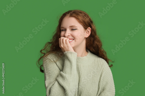 Portrait of shy young woman...