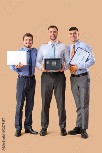 Happy young men holding saf...