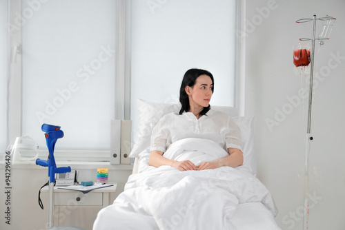 Female patient lying on bed...