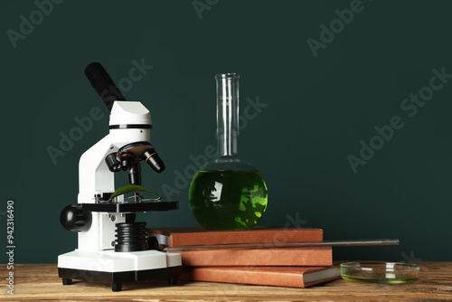 Microscope with green leaf ...