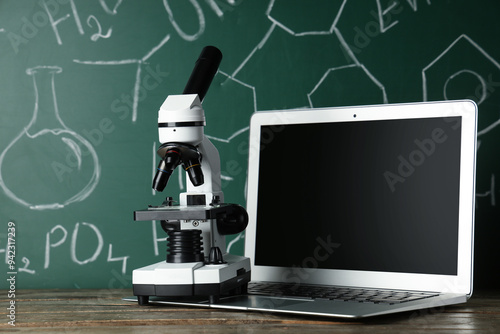 Modern microscope and lapto...
