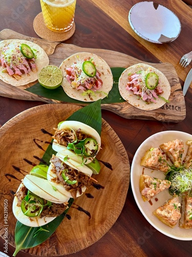 tacos and bao bun appetizers at aesthetic restaurant 