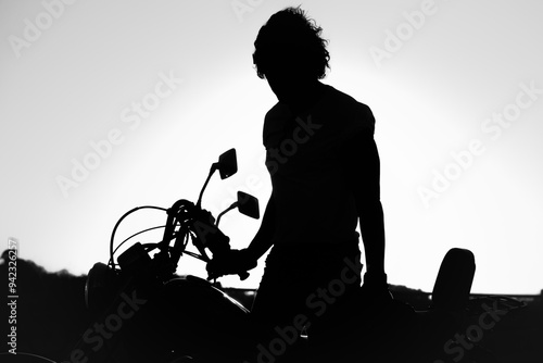 silhouette of biker