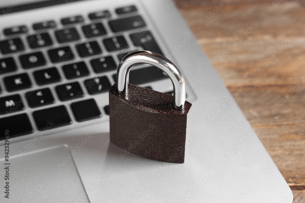 Padlock on laptop, closeup. Cyber security concept Padlock on laptop, closeup. Cyber security concept